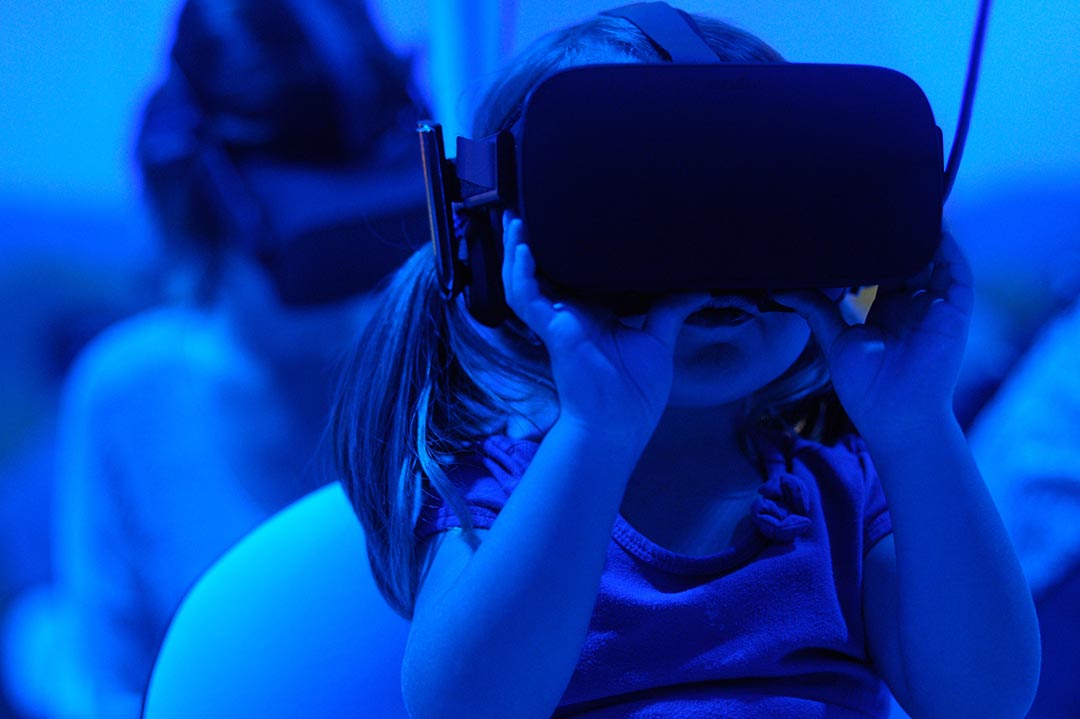girl wearing a VR goggle